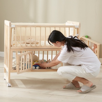 Portable solid pine wood baby crib